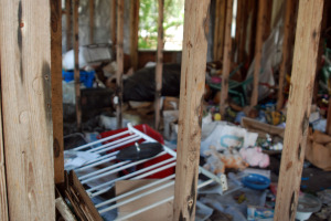 Inside of a torn house filled with toys