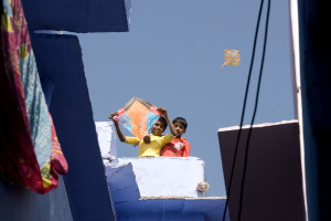 two boys flying kites